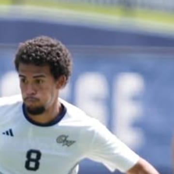 Jaden Dubon on the move in the white George Washington kit